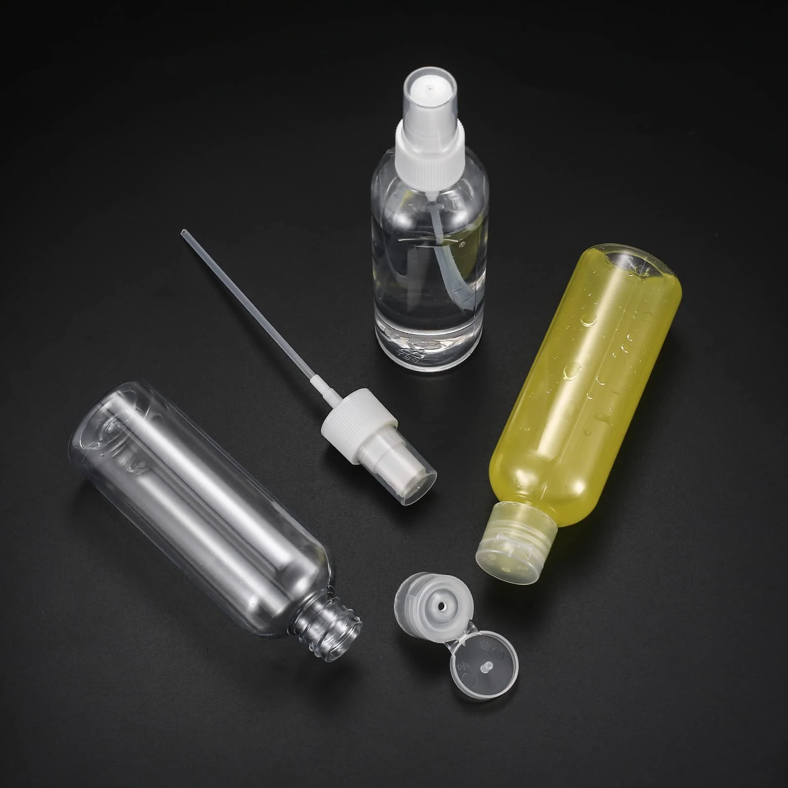 Zestaw podróżnych butelek 100ml plastikowe z 2 dyszami i 2 lejkami