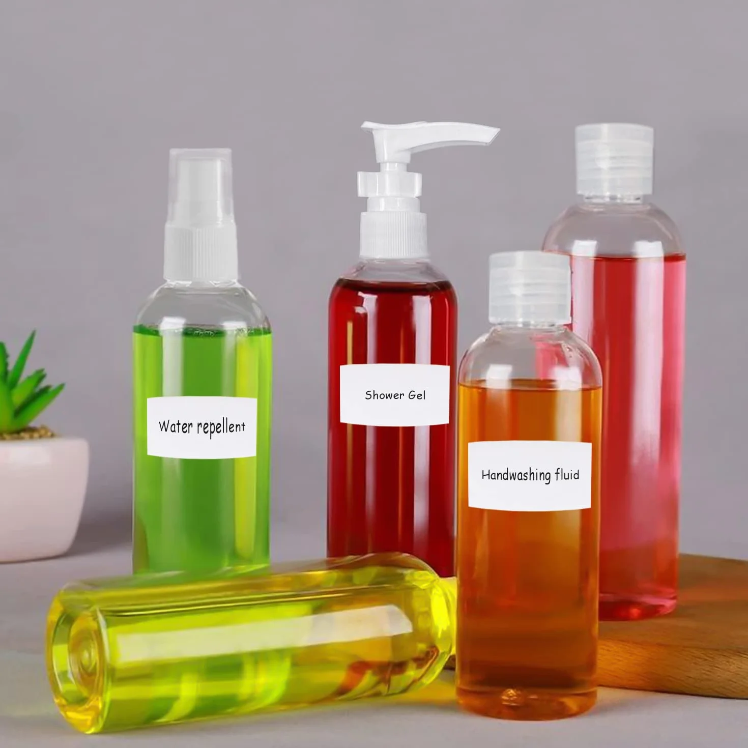 Zestaw przezroczystych butelek podróżnych 100 ml z rozpylaczem do płynów